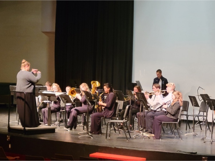 Northern Valley High School band students playing on stage