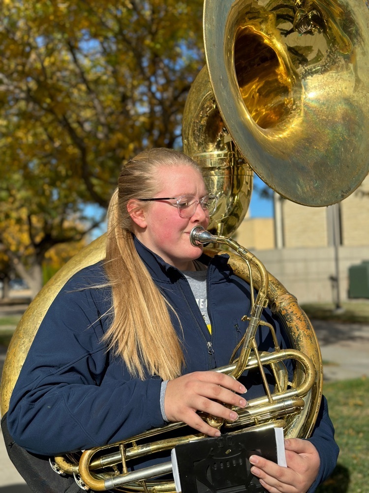 Brookelyn Schurman playing a Fort Hays sousaphone